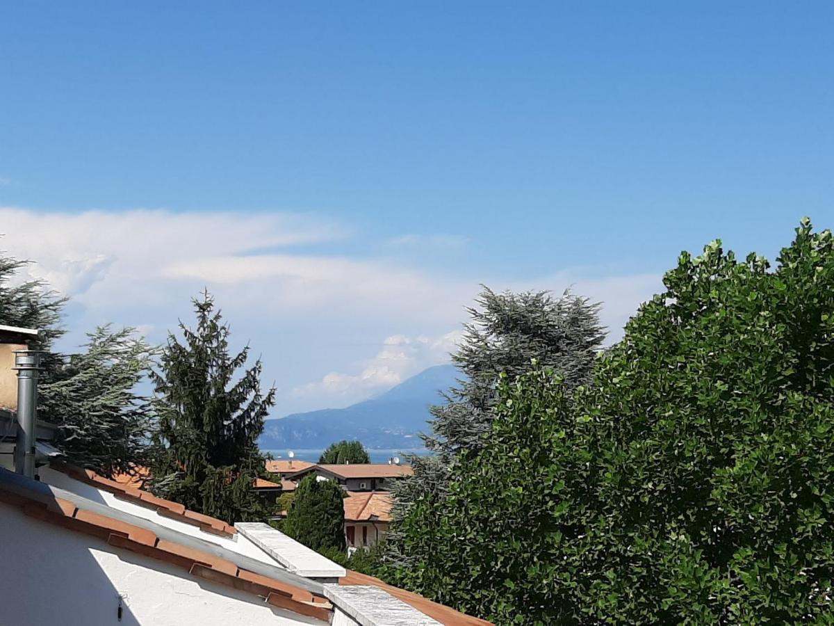 Appartamento Genziana - Con Vista Piscina E Garage Sirmione Zewnętrze zdjęcie